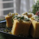 cornbread on black ceramic plate